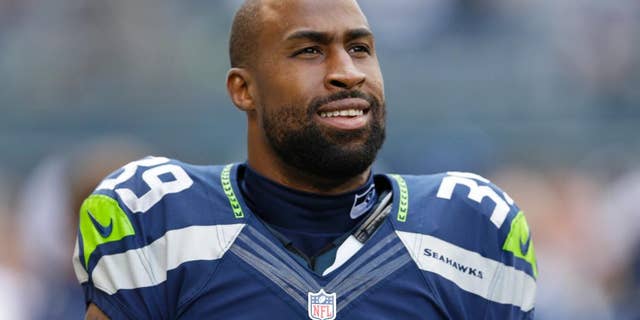 FILE - In this Sept. 22, 2013, file photo, Seattle Seahawks' Brandon Browner stands before an NFL football game against the Jacksonville Jaguars in Seattle. Former Seahawks cornerback Browner has signed with the New England Patriots. (AP Photo/Ted S. Warren, File)