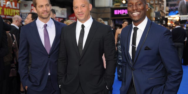 LONDON, ENGLAND - MAY 07: Actors Paul Walker, Vin Diesel and Tyrese Gibson attend the "Fast & Furious 6" World Premiere at The Empire, Leicester Square on May 7, 2013 in London, England. (Photo by Stuart C. Wilson/Getty Images for Universal Pictures)