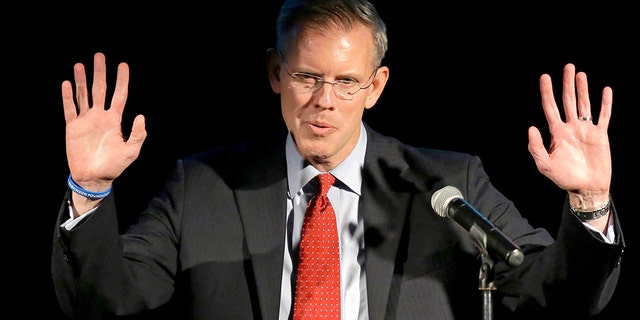 Kansas congressional hopeful Paul Davis, a Democrat, is the target of a new campaign ad which highlights the time he was caught at a strip club during a police raid.