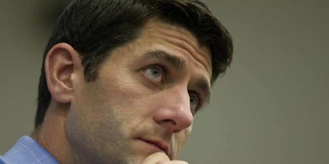 U.S. Rep. Paul Ryan, R-Wis. ponders a question during a listening session Tuesday, April, 26, 2011.  (AP Photo/Jeffrey Phelps)