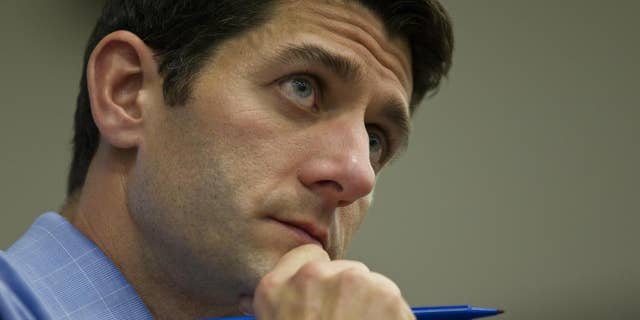 U.S. Rep. Paul Ryan, R-Wis. ponders a question during a listening session Tuesday, April, 26, 2011. (AP Photo/Jeffrey Phelps)