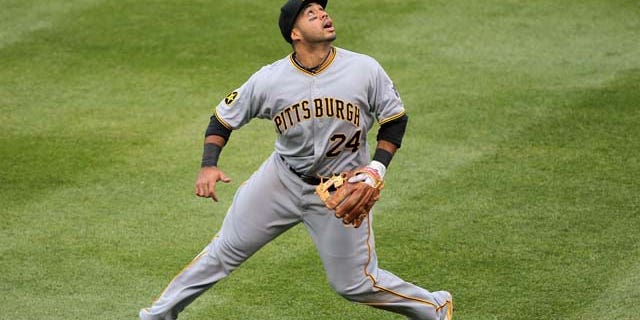 DENVER, CO - MAY 01: Third baseman Pedro Alvarez #24 of the Pittsburgh Pirates tracks down a pop foul against the Colorado Rockies at Coors Field on May 1, 2011 in Denver, Colorado. The Pirates defeated the Rockies 8-4. (Photo by Doug Pensinger/Getty Images)