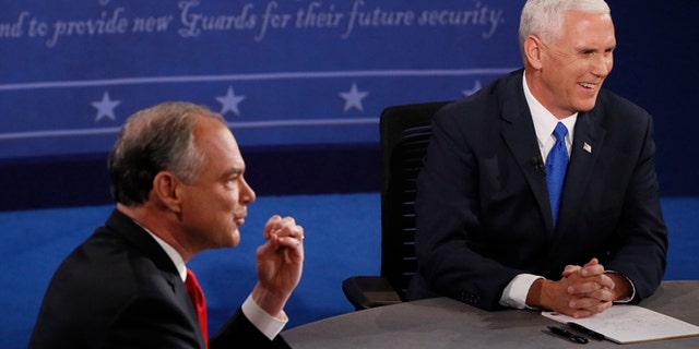 Republican vice-presidential nominee Gov. Mike Pence, right, and Democratic vice-presidential nominee Sen. Tim Kaine debate during the vice-presidential debate at Longwood University in Farmville, Va., Tuesday, Oct. 4, 2016. (Andrew Gombert/Pool via AP)