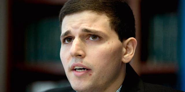 FILE - In this June 8, 2015 file photo, James Vivenzio speaks during a news conference in Philadelphia. Vivenzio, a former Penn State student from Great Falls, Va., who is suing over alleged hazing by his former fraternity, toured the fraternity house with his parents and lawyers for the involved parties seeking evidence for the case. (AP Photo/Matt Rourke, File)