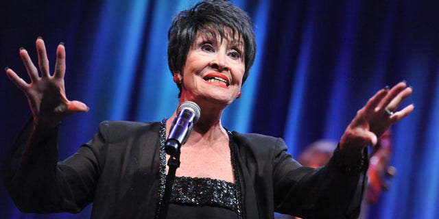 FILE - In a Sunday, Aug. 2, 2015 file photo, Chita Rivera performs during the âChita Rivera: A Lot of Livinâ to Doâ segment of the PBS 2015 Summer TCA Tour held at the Beverly Hilton Hotel in Beverly Hills, Calif. Rivera postponed her show at at Cafe Carlyl after being injured in a fall over the Christmas holiday. Rivera, who was to appear at the legendary venue on Jan. 12-23, will now take the stage from April 19-30 as she recovers from a pelvic stress fracture. (Photo by Richard Shotwell/Invision/AP, File)