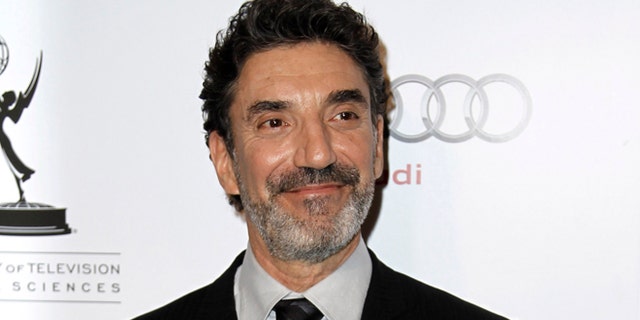 FILE - This March 1, 2012 file photo shows honoree Chuck Lorre at the Academy of Television Arts and Sciences 21st Annual Hall of Fame Gala in Beverly Hills, Calif. Lorre who writes, produces and is a co-creator of such sitcoms as Two and a Half Men, The Big Bang Theory and Mike and Molly is publishing a coffee table book of the cards called, What Doesn't Kill Us, Makes Us Bitter. The book will be published by Simon & Schuster, a division of CBS Corporation, in October. (AP Photo/Matt Sayles, file)