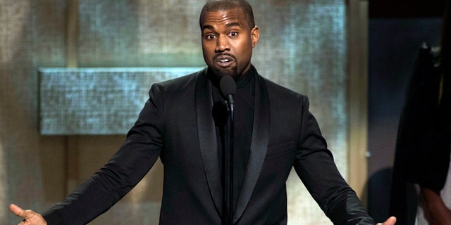 In this Jan. 24, 2015, photo, BET Honoree Kanye West accepts the Visionary Award at the BET Honors 2015 at Warner Theater in Washington.  (Photo by Kevin Wolf/Invision/AP, File)