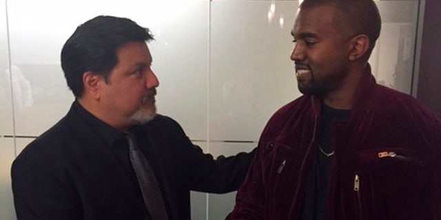 This March 2015 photo provided by courtesy of Allred, Maroko and Goldberg shows videographer Daniel Ramos, left, and Kanye West, shaking hands after West apologized to Ramos as part of a settlement, in Los Angeles. This assault case was set for trial next week on April 14, 2015, but Ramos' lawyer, Gloria Allred, filed for a dismissal on April 7, after a settlement was agreed to by both parties. One important aspect of the settlement was an apology by West to Ramos. (AP Photo/Courtesy Allred, Maroko and Goldberg)
