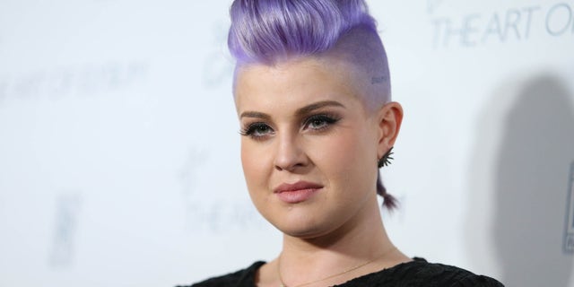 FILE - In this Jan. 10, 2015 file photo, Kelly Osbourne arrives at The Art of Elysium Heaven Gala at Hangar 8 in Santa Monica, Calif. Osbourne apologized Tuesday, Aug. 4, 2015, for comments she made earlier in the day on "The View" about Latinos cleaning Donald Trump's toilets. (Photo by Omar Vega/Invision/AP, File)