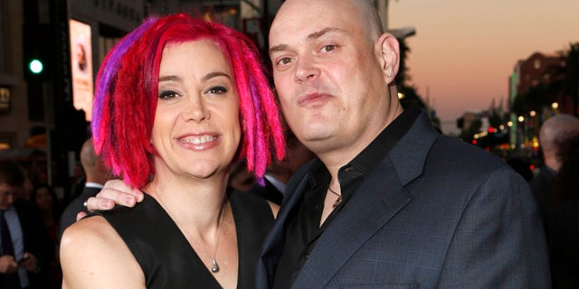 FILE - In this Oct. 24, 2012, file photo, co-directors Lana Wachowski and Andy Wachowski pose for a photo at the Los Angeles premiere of 'Cloud Atlas'. (Photo by Todd Williamson/Invision, File)
