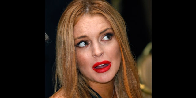 April 28, 2012: File photo, Lindsay Lohan attends the White House Correspondents' Association Dinner in Washington.