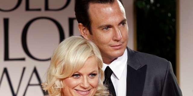 Jan. 15, 2012: Actors Amy Poehler, left, and Will Arnett arrive at the 69th Annual Golden Globe Awards in L.A.
