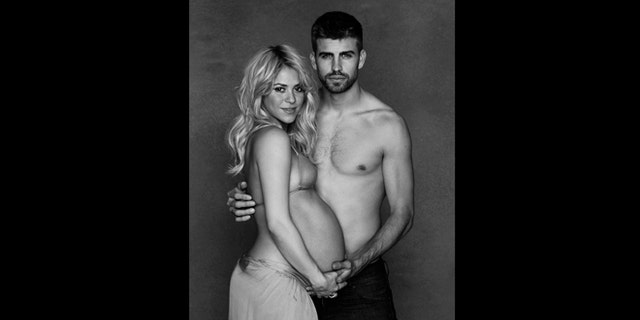 This December 2012 image released courtesy of singer and UNICEF Goodwill Ambassador Shakira shows her posing with FC Barcelona star Gerard Piqué.