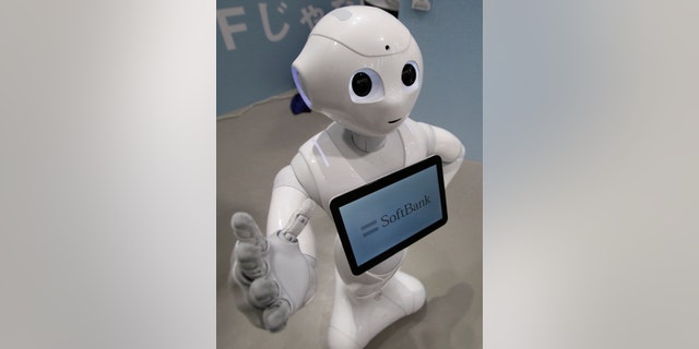 File photo - SoftBank Corp's human-like robot named 'pepper' is displayed at its branch in Tokyo June 6, 2014.