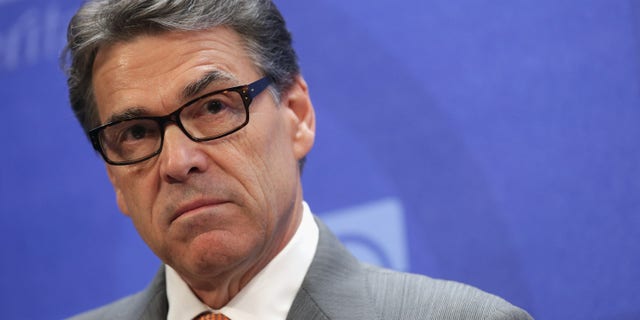 WASHINGTON, DC - AUGUST 21: Texas Governor Rick Perry delivers remarks about immigration and the need for more aggressive enforcement along the Texas-Mexico border at the conservative think tank The Heritage Foundation August 21, 2014 in Washington, DC. The governor of Texas since 2000 and a one-time presidential candidate, Perry was recently indicted by a Travis County grand jury for abuse of power and coercion of a public servant after he vetoed $7.5 million in funding for the state's Public Integrity Unit, which is investigating Perry's Cancer Prevention and Research Institute of Texas. (Photo by Chip Somodevilla/Getty Images)