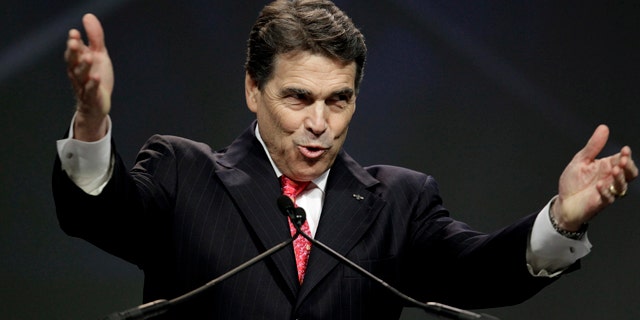 Gov. Rick Perry speaks earlier this month at a call to prayer for a nation in crisis.