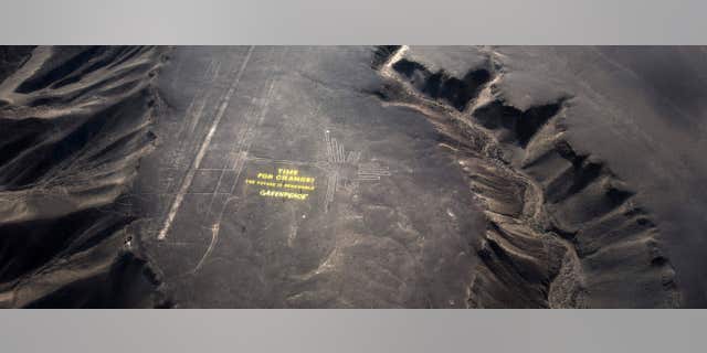 In December 2014, Greenpeace activists set up large letters beside one of the designs that read: “Time for Change! The future is renewable.”
