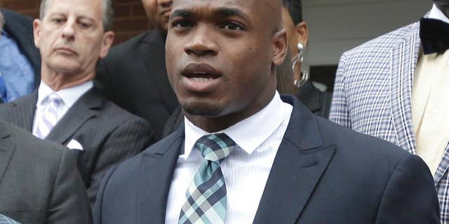 FILE - In this Nov. 4, 2014, file photo, Minnesota Vikings running back Adrian Peterson speaks to the media after pleading no contest to an assault charge in Conroe, Texas. Peterson will meet with the NFL on Monday, Nov. 17, 2014, about possible reinstatement with the Vikings. A person with knowledge of the hearing told The Associated Press on Thursday, Nov. 13, that the hearing will be at 2 p.m. EST. The person spoke on condition of anonymity because the hearing has not been announced. (AP Photo/Pat Sullivan, File)