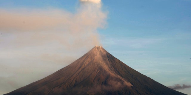 Mayon volcano spews ash anew in another "ash explosion" as viewed in Legazpi city, Albay province, about 500 kilometers south of Manila. Security forces will forcibly evacuate thousands of residents reluctant to leave their farms around the slopes of the country's most active volcano despite fears of a major eruption.