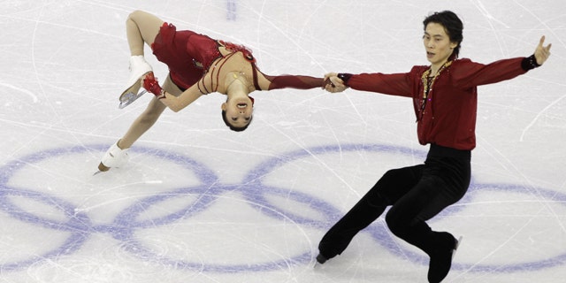 China's Pang Qing and Tong Jian perform their pairs free program during the figure skating competition at the Vancouver 2010 Olympics in Vancouver, British Columbia, Monday, Feb. 15, 2010.