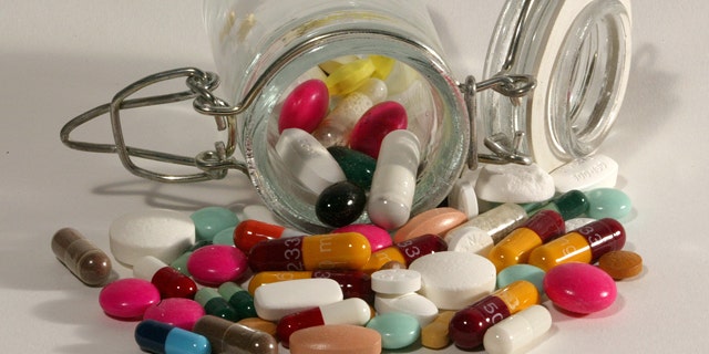 File photo illustration of pills of all kinds, shapes and colours, March 2003. HALTH NO RIGHTS CLEARANCES OR PERMISSIONS ARE REQUIRED FOR THIS IMAGE REUTERS/Jacky Naegelen  JNA/MA