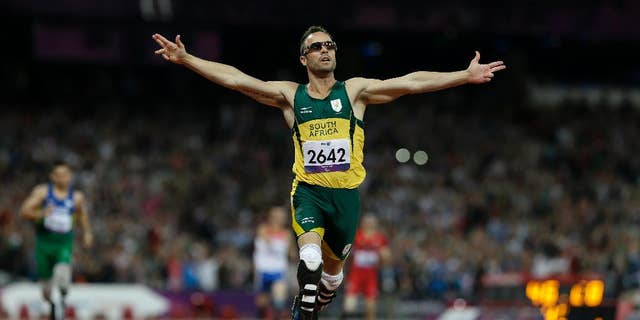 FILE - In this Saturday, Sept. 8, 2012 file photo, South Africa's Oscar Pistorius wins gold in the men's 400-meter T44 final at the 2012 Paralympics, in London. The man who racing commentators said was slow from the starting blocks, Pistorius went on to win many medals for his running prowess, but is now expected to testify in his own defense during his trial in South Africa for the killing of his girlfriend Reeva Steenkamp. (AP Photo/Kirsty Wigglesworth, File)