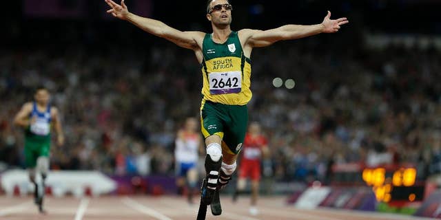 FILE - In this Saturday, Sept. 8, 2012 file photo, South Africa's Oscar Pistorius wins gold in the men's 400-meter T44 final at the 2012 Paralympics, in London. The man who racing commentators said was slow from the starting blocks, Pistorius went on to win many medals for his running prowess, but is now expected to testify in his own defense during his trial in South Africa for the killing of his girlfriend Reeva Steenkamp. (AP Photo/Kirsty Wigglesworth, File)