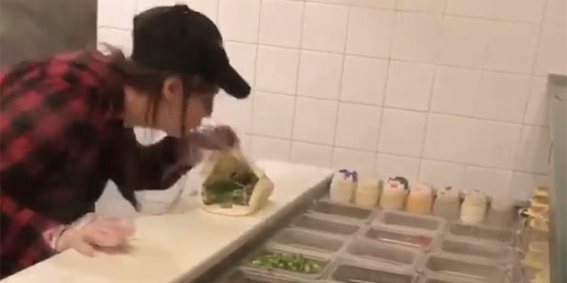 Fast-food employee spits on customer's food in viral video ...