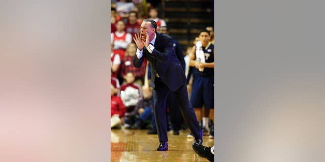 Pittsburgh head coach Jamie Dixon yells instructions during the first half of an NCAA college basketball game against Indiana, Tuesday, Dec. 2, 2014, in Bloomington, Ind. (AP Photo/Darron Cummings)