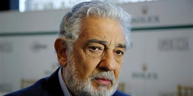 For decades, Placido Domingo, one of the most celebrated and powerful men in opera, has tried to pressure women into sexual relationships by dangling jobs and then sometimes punishing the women professionally when they refused his advances, numerous accusers told The Associated Press. (AP Photo/Damian Dovarganes, File)