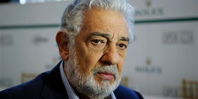 Spanish tenor Placido Domingo gives details about the opera competition Operalia at the Dorothy Chandler Pavilion in Los Angeles, Tuesday, Aug. 26, 2014. The legendary opera singer has been accused of sexual harassment by several women.