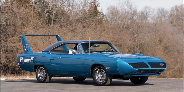 The car here has 66,000 claimed original miles equipped with a 440 cubic inch (7.2-liter) V-8 with three two-barrel carburetors, a four-speed manual and a striking B5 Blue exterior over white bucket seats.