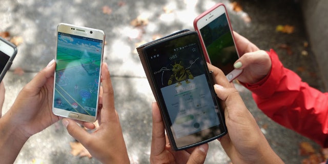 NEW YORK, NY - JULY 29: Children play Pokemon Go in Central Park as Pokemon Go craze hits New York City on July 29, 2016 in New York City. (Photo by Michael Loccisano/Getty Images)
