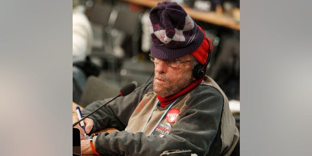 Nov. 22, 2013: A delegate attends the closing session of the 19th conference of the United Nations Framework Convention on Climate Change in Warsaw, Poland.