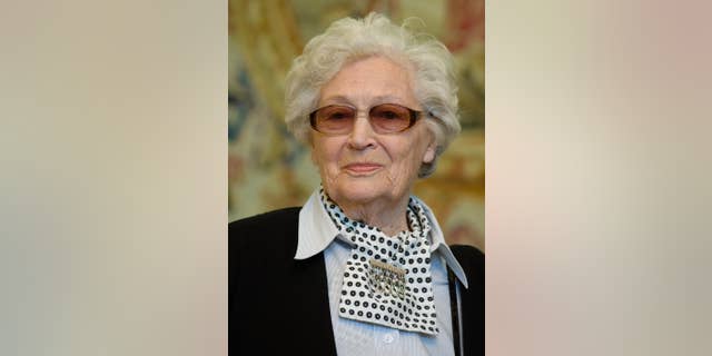 FILE - In this March 19, 2012 file photo Jadwiga Pilsudska-Jaraczewska attends a ceremony at the Belweder Palace in Warsaw. Pilsudska-Jaraczewska, a World War II pilot and a daughter of Marshal Jozef Pilsudski, the father of Poland's independence, died on Nov. 16, 2014. She was 94. (AP Photo/Str)