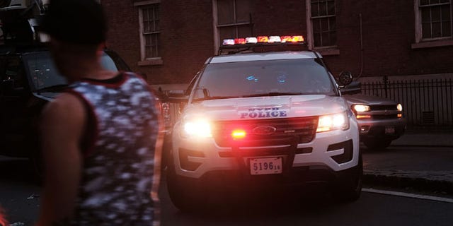 NEW YORK, NY - JUNE 12: A heavy police presence gathers near the iconic New York City gay and lesbian bar The Stonewall Inn to following the mass killings in Orlando last evening on June 12, 2016 in New York City. An American-born man who'd recently pledged allegiance to ISIS killed 50 people early Sunday at a gay nightclub in Orlando, Florida. The massacre was the deadliest mass shooting in the United States. (Photo by Spencer Platt/Getty Images)