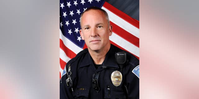 This undated photo provided by the Rio Rancho Police Department shows Officer Gregg Benner. The officer was shot and killed during a traffic stop on Monday, May 25, 2015, in Rio Rancho, N.M. (Rio Rancho Police Department via AP)