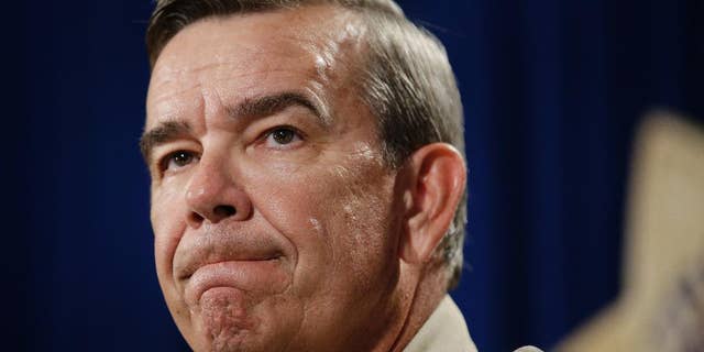 June 8, 2014: Clark County (Nev.) Sheriff Doug Gillespie speaks at a news conference on the shooting of two Las Vegas Metropolitan Police Department officers. (AP Photo/John Locher)