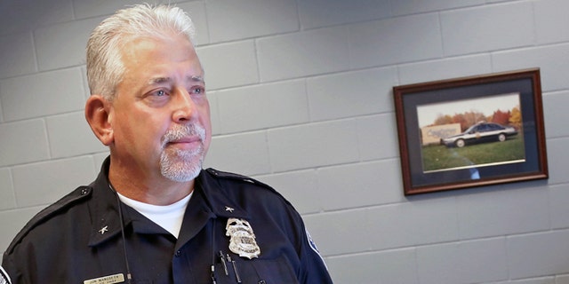 St. Anthony police chief Jon Mangseth poses for a photo Wednesday, Aug. 17, 2016, in St. Anthony, Minn. The chief of the suburban St. Paul police department whose officer shot and killed a black man during a July traffic stop is ready to defend his employee. Mangseth's interview with The Associated Press Wednesday marks his first public comments on the July 6 shooting of Philando Castile since the incident made St. Anthony's police department one of the latest to confront an officer-involved shooting of a black man. (AP Photo/Jim Mone)