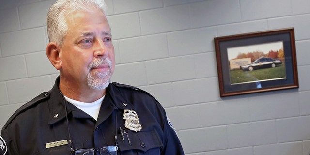 St. Anthony police chief Jon Mangseth poses for a photo Wednesday, Aug. 17, 2016, in St. Anthony, Minn. The chief of the suburban St. Paul police department whose officer shot and killed a black man during a July traffic stop is ready to defend his employee. Mangseth's interview with The Associated Press Wednesday marks his first public comments on the July 6 shooting of Philando Castile since the incident made St. Anthony's police department one of the latest to confront an officer-involved shooting of a black man. (AP Photo/Jim Mone)