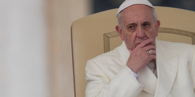 FILE -- Jan. 22, 2014: file photo, Pope Francis attends his weekly general audience in St. Peter's Square at the Vatican.