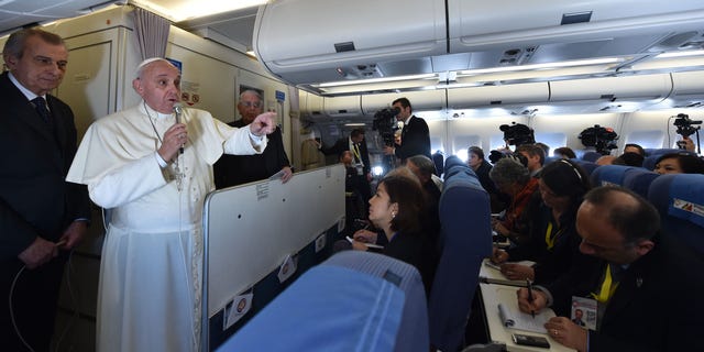 Jan. 19, 2015 - Pope Francis talks with journalists during his flight from Manila to Rome. Although the trips are unconfirmed, Francis is expected to visit Philadelphia, the White House, and the UN in New York in September.
