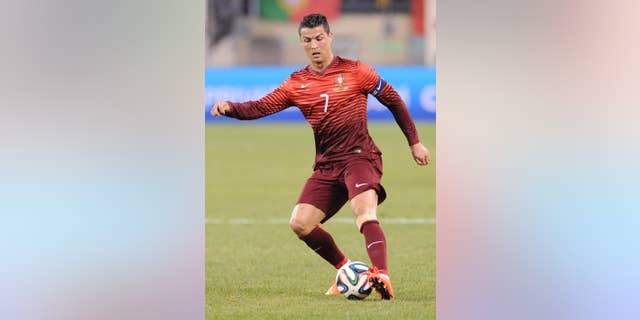 Portugal's Cristiano Ronaldo controls the ball during the second half of an international friendly soccer match against the Republic of Ireland Tuesday, June 10, 2014, in East Rutherford, N.J. Portugal won 5-1. (AP Photo/Bill Kostroun)