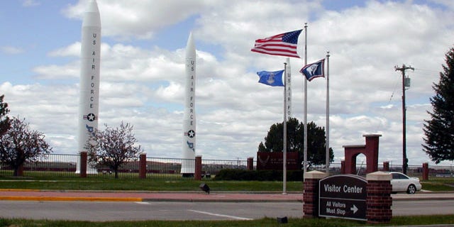 May 13, 2005: This photo shows the three types of missiles that flank the main gate of F.E. Warren Air Force Base, Wyo. An Air Force spokesman said an equipment failure disrupted communication between 50 nuclear missiles and the launch control center at the base on Oct. 23.