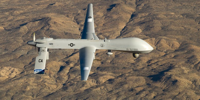 A U.S. Air Force MQ-1 Predator unmanned aerial vehicle assigned to the California Air National Guard's 163rd Reconnaissance Wing flies near the Southern California Logistics Airport in Victorville, California in this January 7, 2012 USAF handout photo obtained by Reuters February 6, 2013.    REUTERS/U.S. Air Force/Tech. Sgt. Effrain Lopez/Handout     (UNITED STATES - Tags: MILITARY POLITICS) THIS IMAGE HAS BEEN SUPPLIED BY A THIRD PARTY. IT IS DISTRIBUTED, EXACTLY AS RECEIVED BY REUTERS, AS A SERVICE TO CLIENTS. FOR EDITORIAL USE ONLY. NOT FOR SALE FOR MARKETING OR ADVERTISING CAMPAIGNS - RTR3DF74