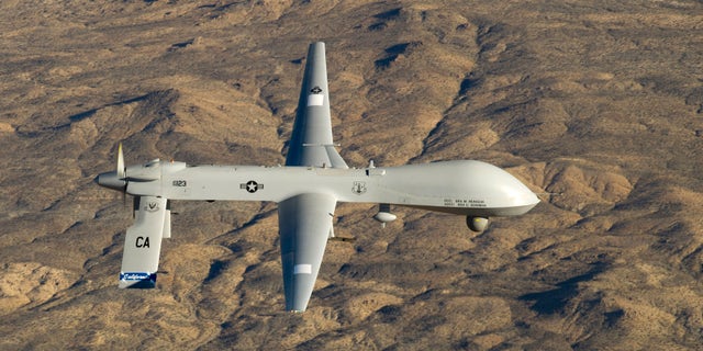 A U.S. Air Force MQ-1 Predator unmanned aerial vehicle assigned to the California Air National Guard's 163rd Reconnaissance Wing flies near the Southern California Logistics Airport in Victorville, California in this January 7, 2012 USAF handout photo obtained by Reuters February 6, 2013. REUTERS/U.S. Air Force/Tech. Sgt. Effrain Lopez/Handout (UNITED STATES - Tags: MILITARY POLITICS) THIS IMAGE HAS BEEN SUPPLIED BY A THIRD PARTY. IT IS DISTRIBUTED, EXACTLY AS RECEIVED BY REUTERS, AS A SERVICE TO CLIENTS. FOR EDITORIAL USE ONLY. NOT FOR SALE FOR MARKETING OR ADVERTISING CAMPAIGNS - RTR3DF74