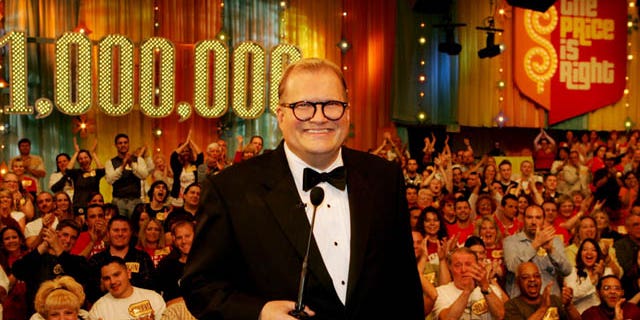 In this February 2008 publicity image released by CBS Entertainment, host Drew Carey hosts pauses during a taping of of "The Price is Right Million Dollar Spectacular."