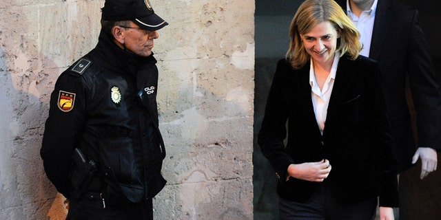 PALMA DE MALLORCA, SPAIN - FEBRUARY 08: Princess Cristina of Spain leaves the Palma de Mallorca Couthouse after giving evidence during the 'Noos Trial' on February 8, 2014 in Palma de Mallorca, Spain. Princess Cristina of Spain will give evidence as part of the trial against her husband Inaki Urdangarin over allegations that he misused millions of euros of public funds which were allocated to organise sports and tourism events, during his time as chairman of a non-profit foundation from 2004 to 2006. (Photo by David Ramos/Getty Images)