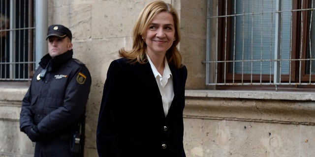 FILE - In this Feb. 8, 2014 file photo, Spain's Princess Cristina arrives at the courthouse of Palma de Mallorca in Palma Mallorca, Spain. A Spanish judge on Monday Dec. 22, 2014 has ordered Princess Cristina to be tried along with her husband on charges of tax fraud, marking the first time that a member of the countryâs royal family heads to court since the royalty was restored in 1975. The legal troubles of King Felipe VIâs sister during a four-year probe have damaged the Spanish monarchy's image. (AP Photo/Manu Fernandez, File)