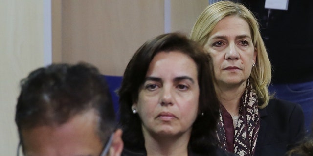 Miguel Ángel Bonet Fiol, Ana Maria Tejeiro Losada and Infanta Cristina of Spain appear in court for a hearing, where they face various charges following an investigation into the Noos Institute Sports Foundation on January 11, 2016 in Palma De Mallorca, Spain. Infanta Cristina of Spain has become the first member of the Spanish royal family to be put on trial, where she faces charges alongside her husband Inaki Urdangarin and 16 other defendants for their part in alleged corruption at the Noos Institute Sports Foundation. It is suspected that the non-profit organization, headed by Urdangarin, embezzled and laundered millions of euros worth of public funding. (Photo by Cati Cladera - Pool/Getty Images)